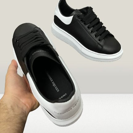 Fashionable Alexander McQueen Black shoes with white detailing