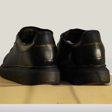 Heal view of  Alexander McQueen shoes with name