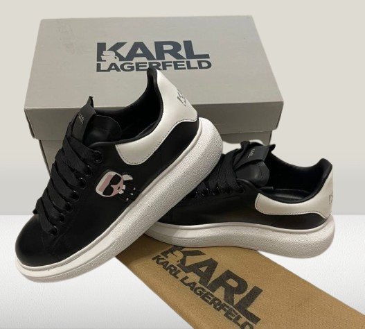 Modern Karl Lagerfeld shoes: black design, white heel, and signature logo