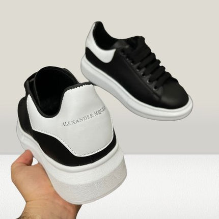 Alexander Mcqueen - Black and White [60% OFF] - ShoeResidenceClose up view of Alexander McQueen Black shoesAlexander Mcqueen36Adidas McQueen NegruAdidas McQueen PantofAdidas Neagru Alexander10