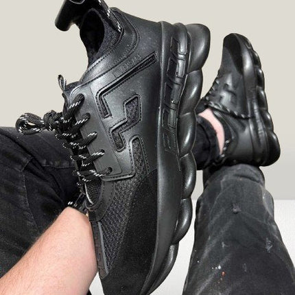 Versace Chain Reaction NEGRU [STOC LIMITAT] - ShoeResidenceVersace Chain Reaction wearing in a footVersace36Adidas Pantof Versace BlackAdidas Pantof Versace ChainAdidas Pantof Versace Ieftin3